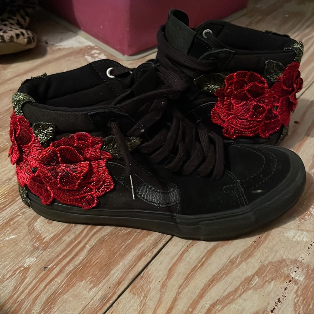 Black mid high vans.(customized w/ rose)